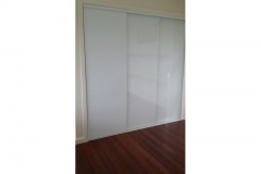 Frameless SuperWhite Glass Sliding Robe Doors