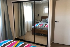 Slimline Mirror Sliding Robe Doors with Black Frames