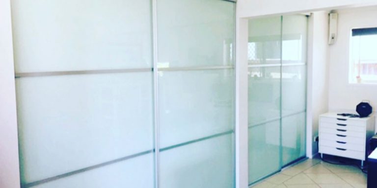 How do I make my wardrobe doors slide better